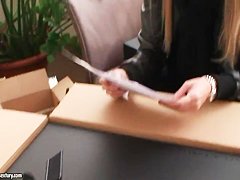 Blonde pornstar Sophie Moone opens her present