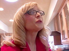 A mature woman seduces a junior brunette.