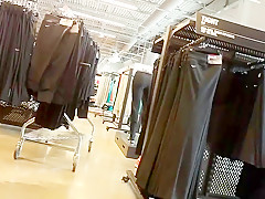 Beautiful blonde worker in store spy