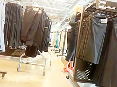 Beautiful blonde worker in store spy