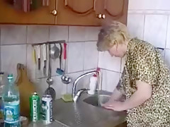 Russian moms Irina - having sex in the kitchen
