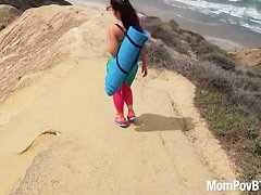 Fitness pro does nude yoga on beach