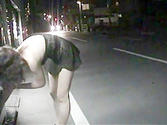 Walking in a midnight town with see-through-dress