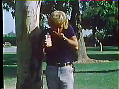 Vintage lady woken up for sex by her husband on bed