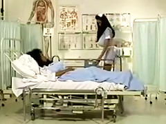 2 busty women playing doctor