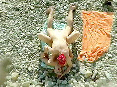 Sex on the beach.Two junior couples fuck on the shore