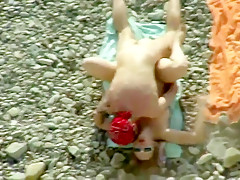 Sex on the beach.Two junior couples fuck on the shore