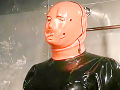 Two Mistresses Miniskirt Slave Up in Latex