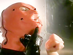 Two Mistresses Miniskirt Slave Up in Latex