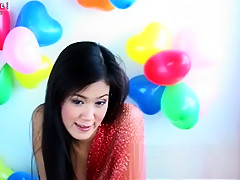 Irene is a horny girl who enjoys playing with her tits for you