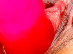 Sensuous brunette with a heart-shaped booty Jane fucks a huge dildo