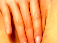 Short haired brunette cutie plays with her youthful tight pussy