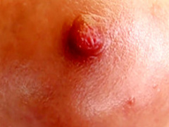 Horny brunette Nelly gets out of her clothes to stick in a big dildo