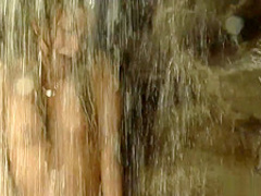 Sexy lesbians play in a beautiful pool and toy their wet pussies