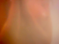 Playboy beauty posing in a shower