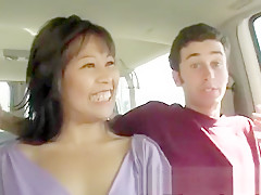 Beautiful Asian milf plays out her sexual fantasy with two young guys