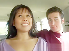 Beautiful Asian milf plays out her sexual fantasy with two young guys