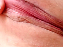 Slender blonde in fishnet stockings Sandra takes care of her desires