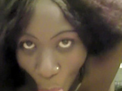 Pretty ebony slut knows how to suck a monumental white prick