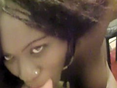 Pretty ebony slut knows how to suck a monumental white prick