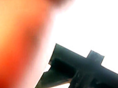 Sweet looking Asian babe in a bikini dances as she gets naked