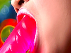 Wine Achara is a horny Asian hottie who enjoys playing with a dildo