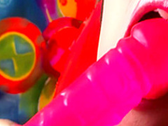 Wine Achara is a horny Asian hottie who enjoys playing with a dildo