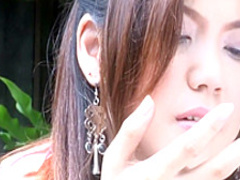 Mesmerizing Oriental girl Ying Charintip gets naughty in the outdoors