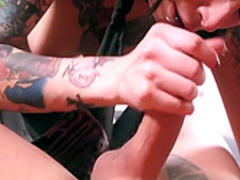 Horny tattooed brunette touches herself and then enjoys a hard prick