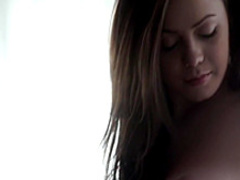 Sensual brunette spreads her legs and rubs her hot velvet purse