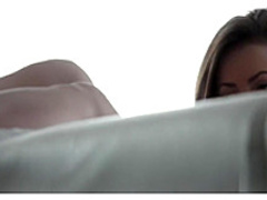 Sensual brunette spreads her legs and rubs her hot velvet purse