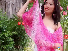 Smoking hot brunette beauty gets playful and buck naked outdoors