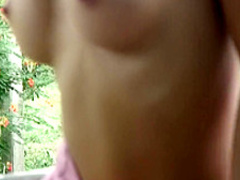 Ravishing Oriental goddess with big hooters Kate poses naked outside