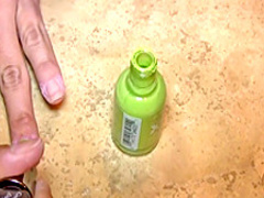 Busty Cali plays in the tub with her plastic duck and shaves her legs