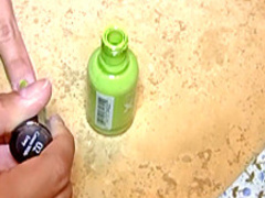 Busty Cali plays in the tub with her plastic duck and shaves her legs