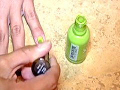 Busty Cali plays in the tub with her plastic duck and shaves her legs