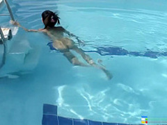 Naughty Oriental girl Jenny shows off her fabulous body in the pool
