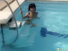 Naughty Oriental girl Jenny shows off her fabulous body in the pool