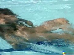 Naughty Oriental girl Jenny shows off her fabulous body in the pool