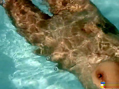 Naughty Oriental girl Jenny shows off her fabulous body in the pool