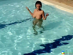Naughty Oriental girl Jenny shows off her fabulous body in the pool