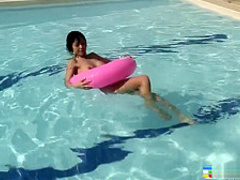 Naughty Oriental girl Jenny shows off her fabulous body in the pool
