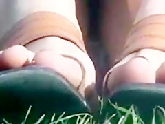 Upskirt panties sitting on grass