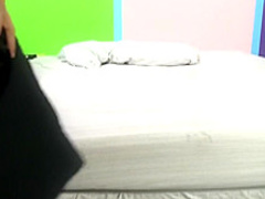 Blonde and brunette nymphos sharing a vibrator and a cock on the bed