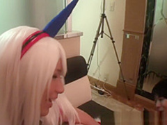 Asian in cosplay jacks one cock while riding another