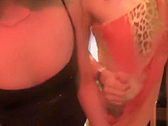 Girls at a party suck on cocks