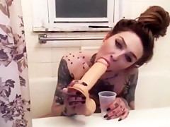 tattoo slut sucks cock deep