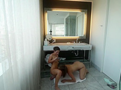 Horny lesbians making a bathroom sex tape