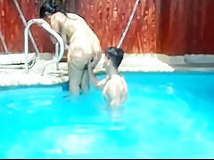 Three guys and one girl fuck in the pool