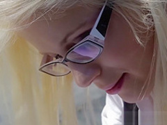Cumshot on glasses makes nerdy gal happy